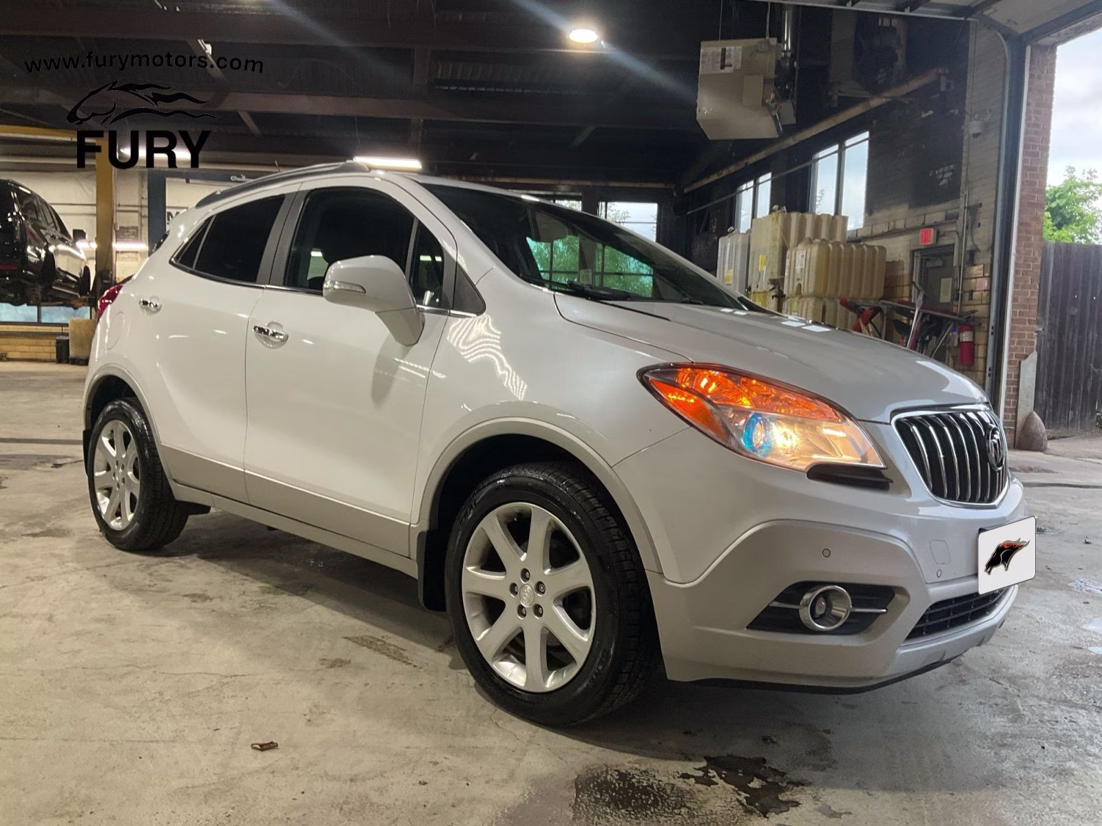 2015 White Pearl Metallic Buick Encore Premium AWD SUV