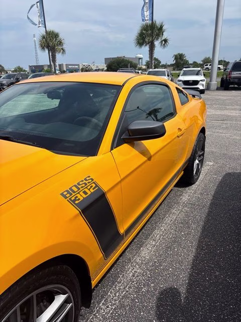 2013 Yellow Ford Mustang Boss 302 RWD Coupe