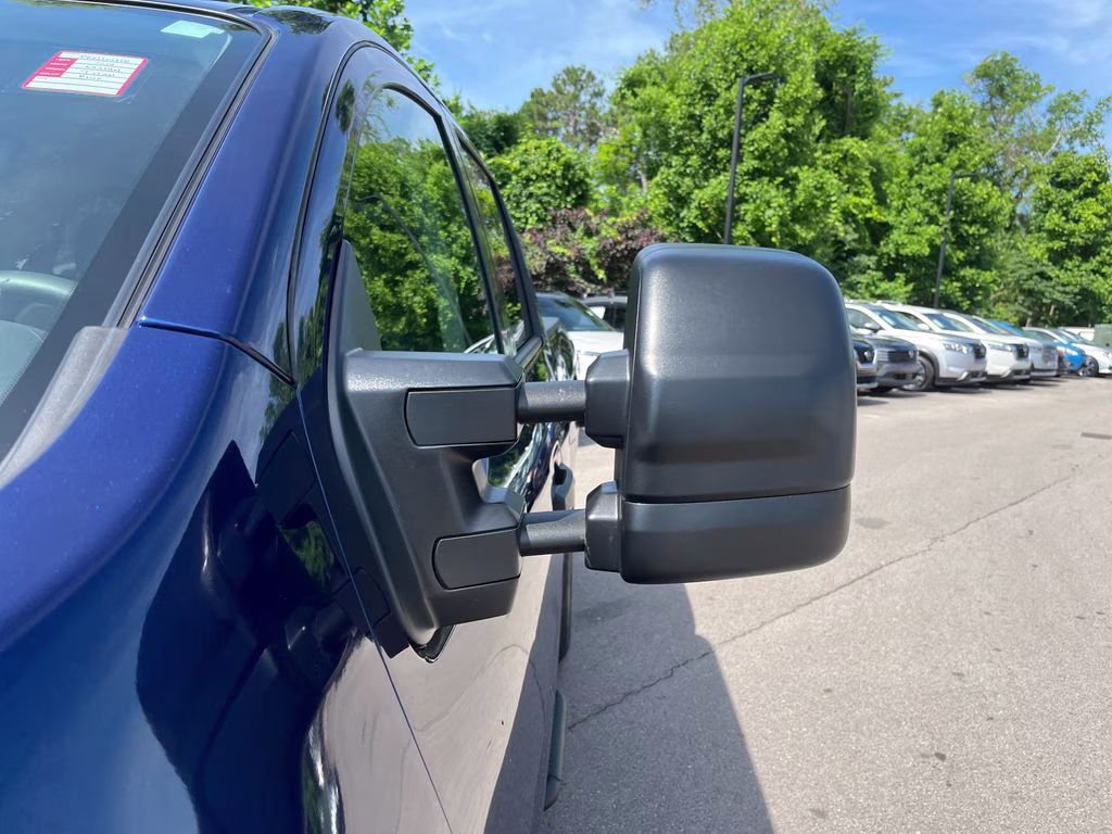 2024 Deep Blue Pearl Nissan Titan SV 4X4 Truck