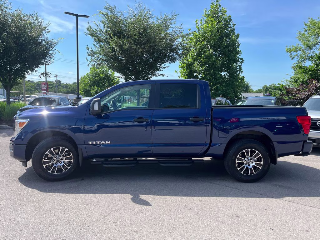 2024 Deep Blue Pearl Nissan Titan SV 4X4 Truck
