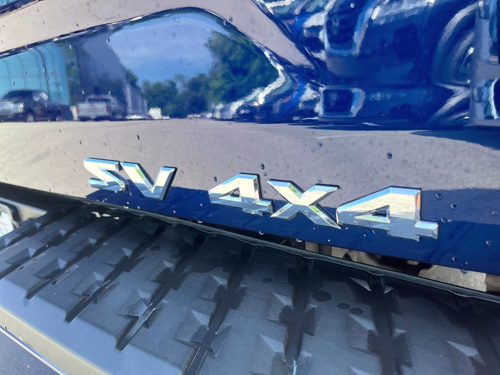 2024 Deep Blue Pearl Nissan Titan SV 4X4 Truck