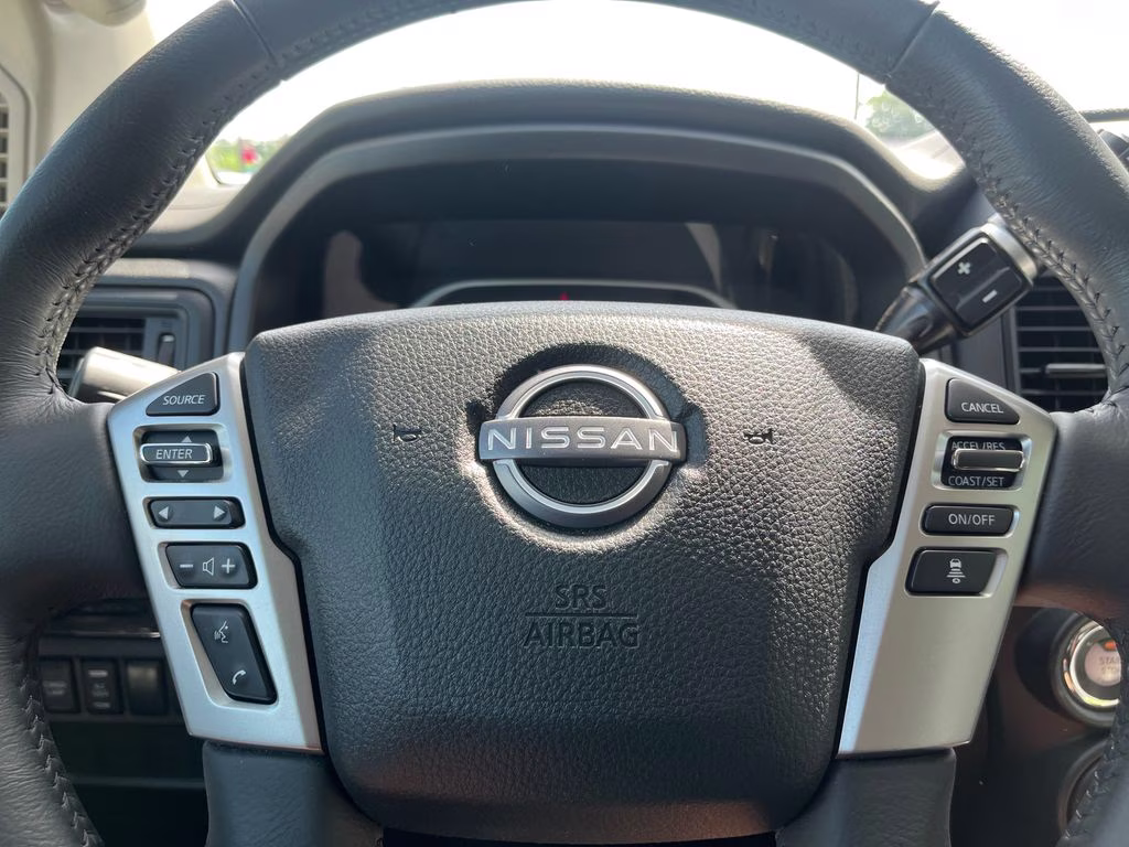 2024 Deep Blue Pearl Nissan Titan SV 4X4 Truck