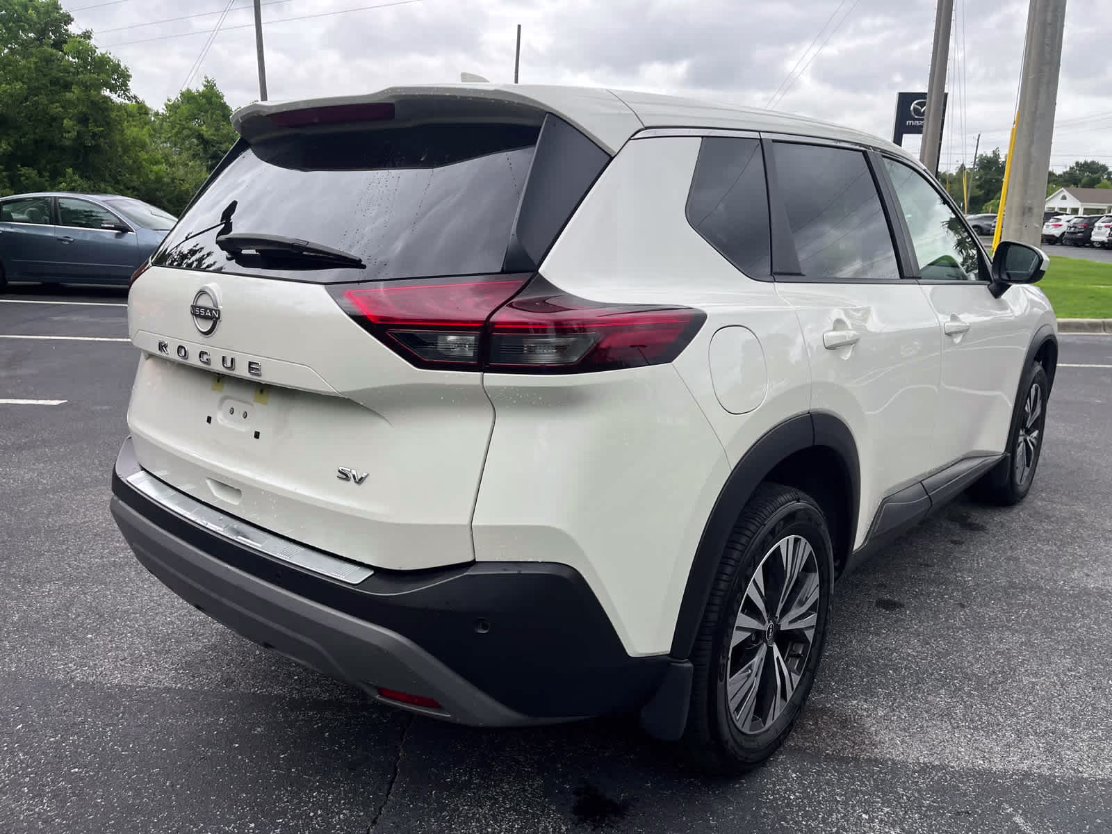 2023 Pearl White Tricoat Nissan Rogue SV FWD SUV