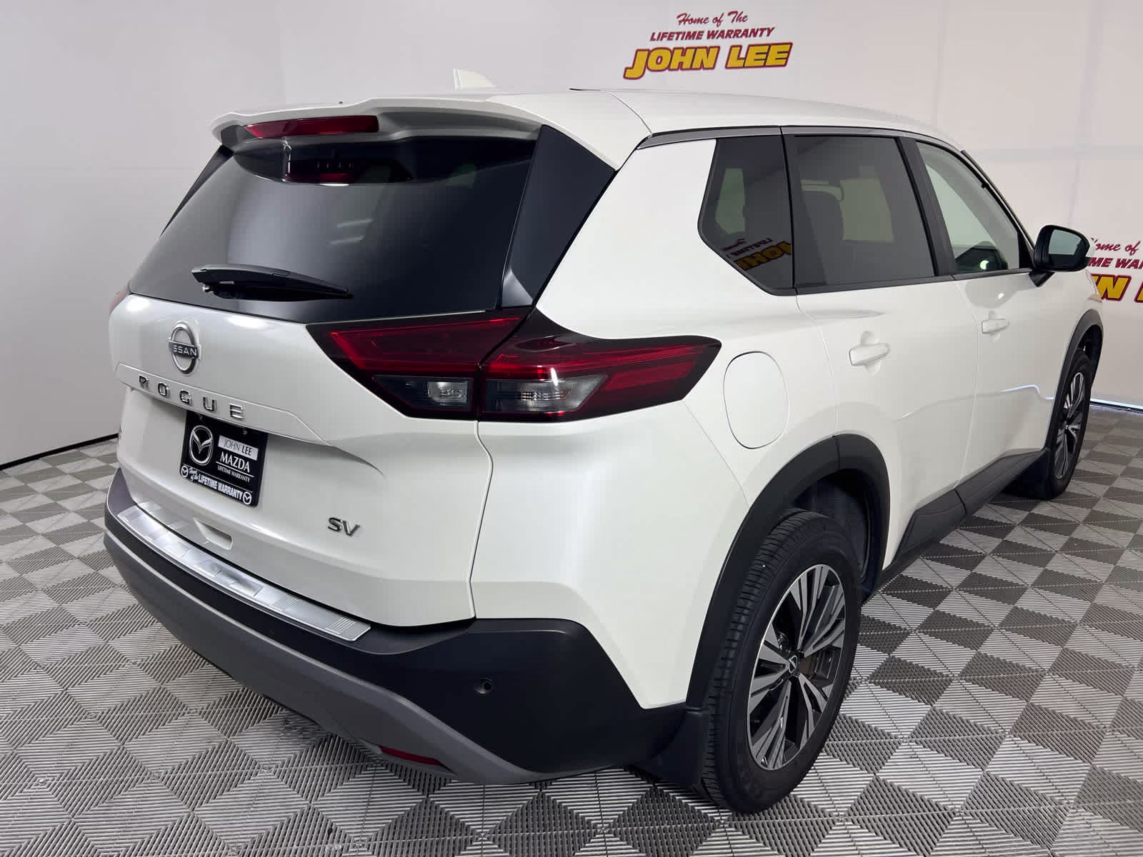 2023 Pearl White Tricoat Nissan Rogue SV FWD SUV