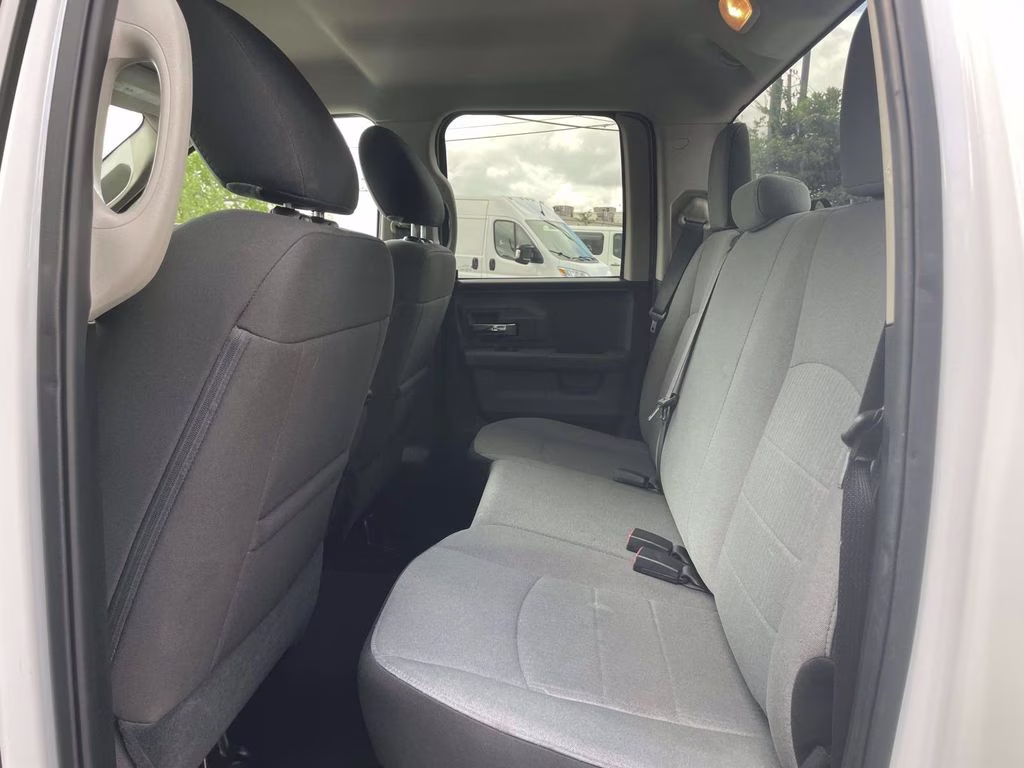 2024 Bright White Clearcoat Ram 1500 Classic SLT 4X4 Truck