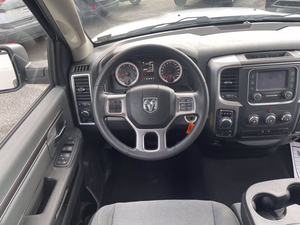 2024 Bright White Clearcoat Ram 1500 Classic SLT 4X4 Truck