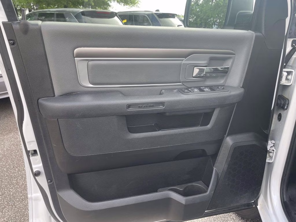 2024 Bright White Clearcoat Ram 1500 Classic SLT 4X4 Truck