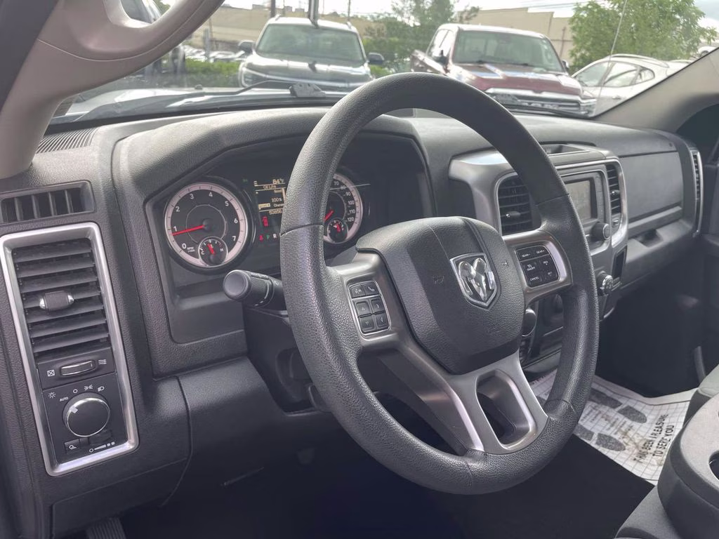 2024 Bright White Clearcoat Ram 1500 Classic SLT 4X4 Truck