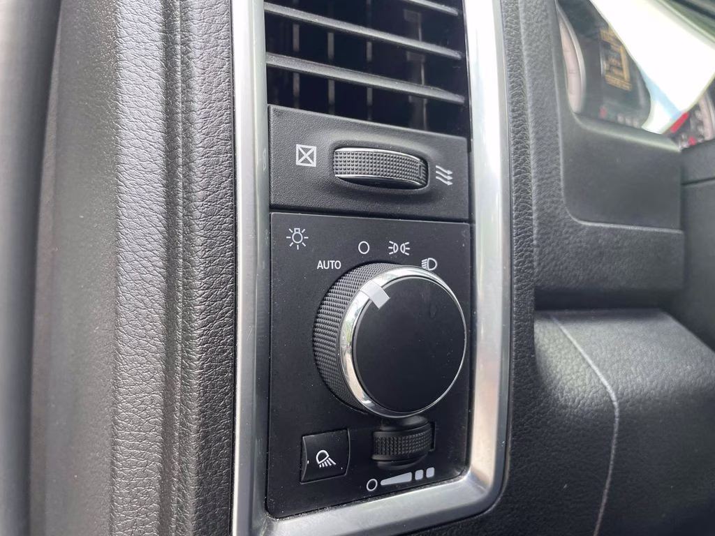 2024 Bright White Clearcoat Ram 1500 Classic SLT 4X4 Truck