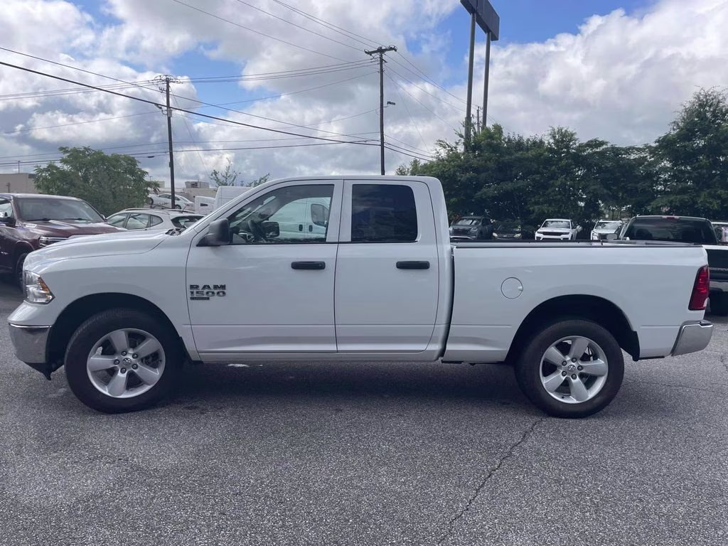 2024 Bright White Clearcoat Ram 1500 Classic SLT 4X4 Truck