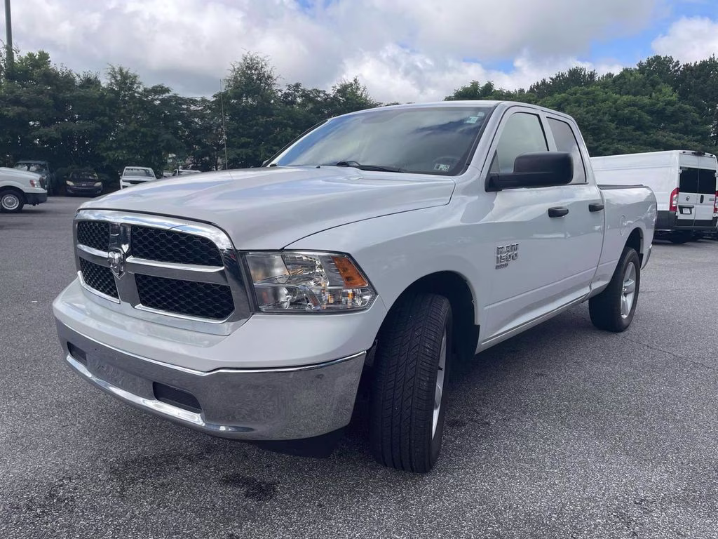 2024 Bright White Clearcoat Ram 1500 Classic SLT 4X4 Truck