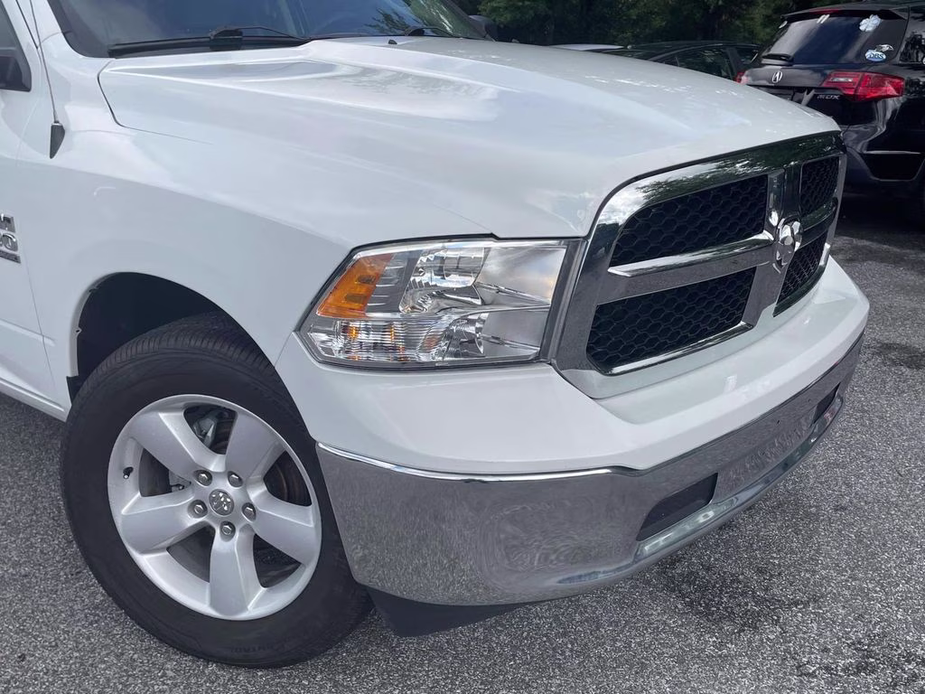 2024 Bright White Clearcoat Ram 1500 Classic SLT 4X4 Truck