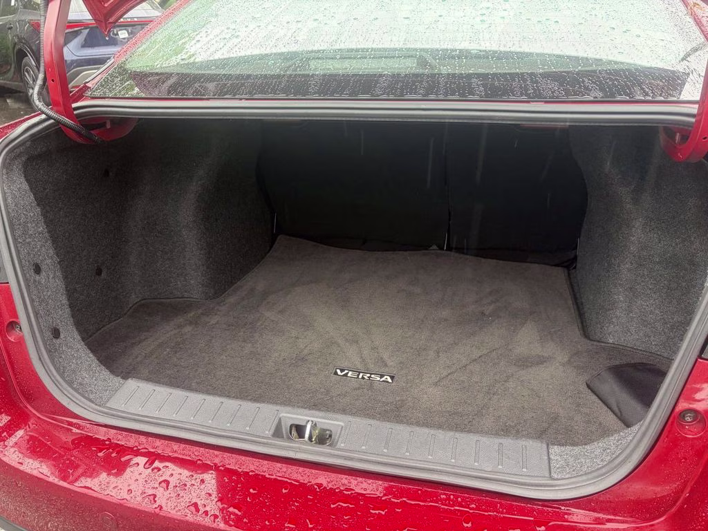 2024 Scarlet Ember Tintcoat Nissan Versa 1.6 SR FWD Sedan