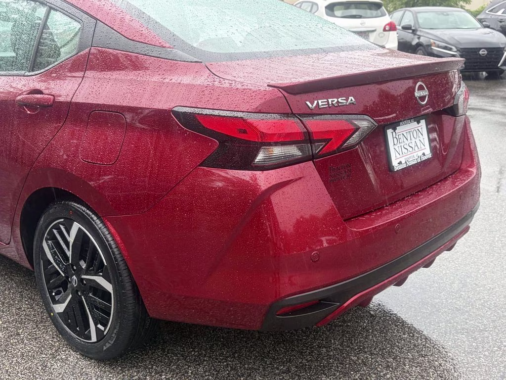 2024 Scarlet Ember Tintcoat Nissan Versa 1.6 SR FWD Sedan