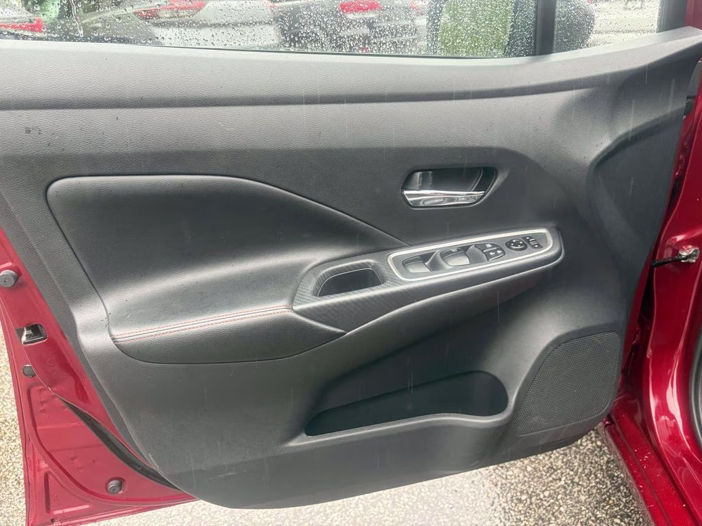 2024 Scarlet Ember Tintcoat Nissan Versa 1.6 SR FWD Sedan