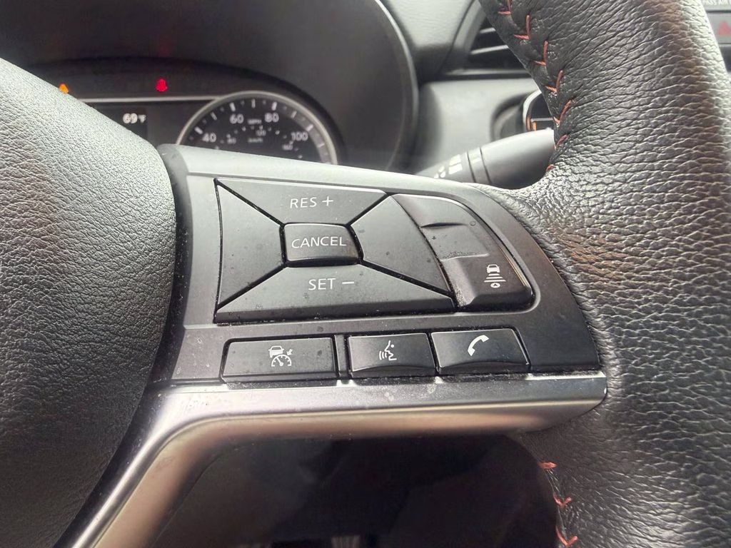 2024 Scarlet Ember Tintcoat Nissan Versa 1.6 SR FWD Sedan