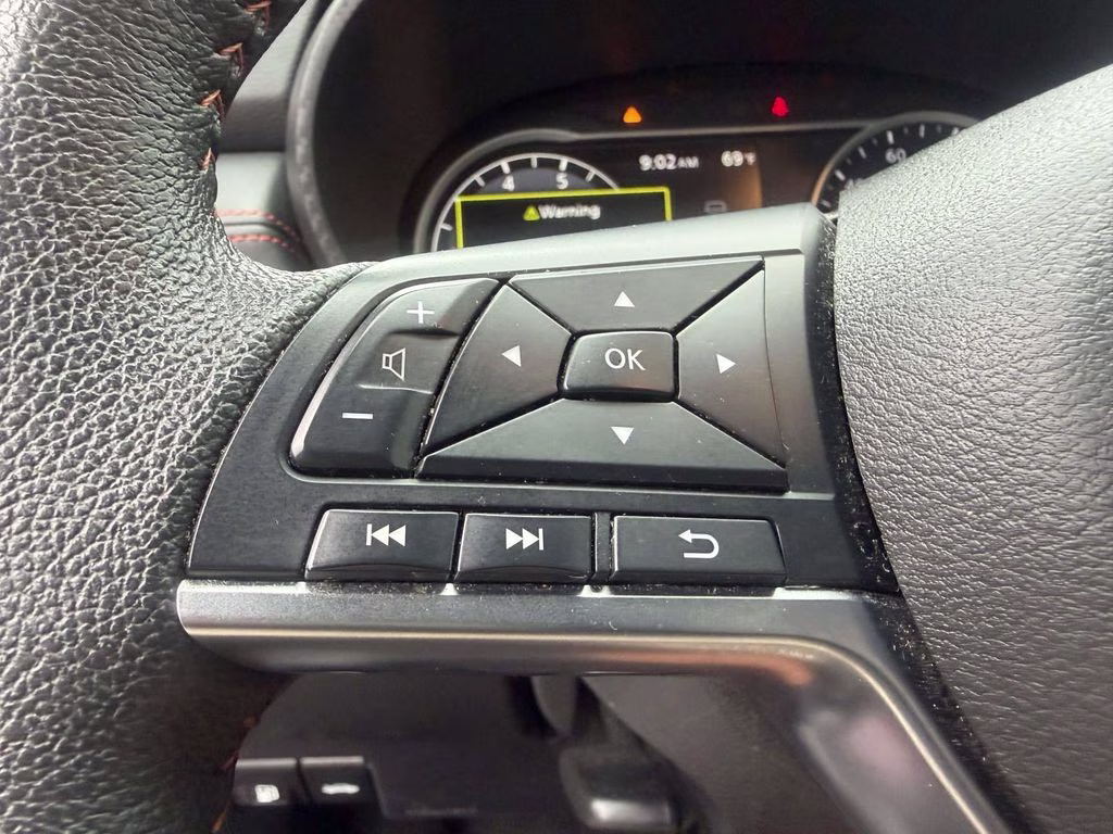 2024 Scarlet Ember Tintcoat Nissan Versa 1.6 SR FWD Sedan