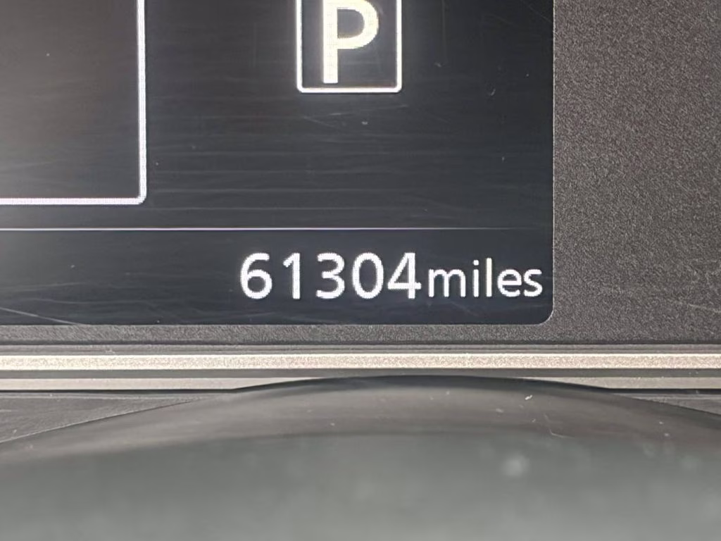 2024 Scarlet Ember Tintcoat Nissan Versa 1.6 SR FWD Sedan