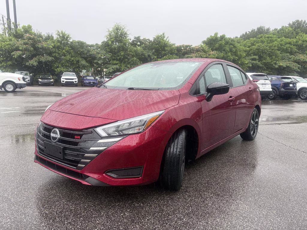 2024 Scarlet Ember Tintcoat Nissan Versa 1.6 SR FWD Sedan
