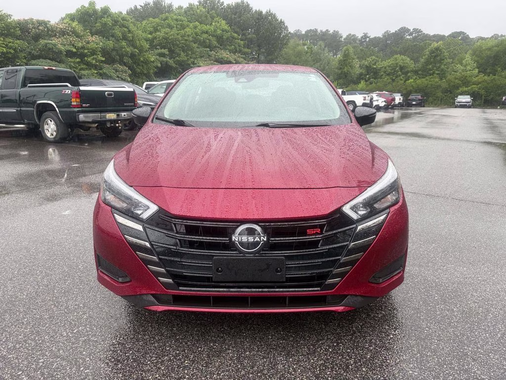 2024 Scarlet Ember Tintcoat Nissan Versa 1.6 SR FWD Sedan
