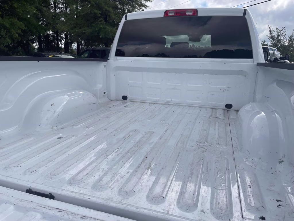 2024 Bright White Clearcoat Ram 1500 Classic SLT 4X4 Truck