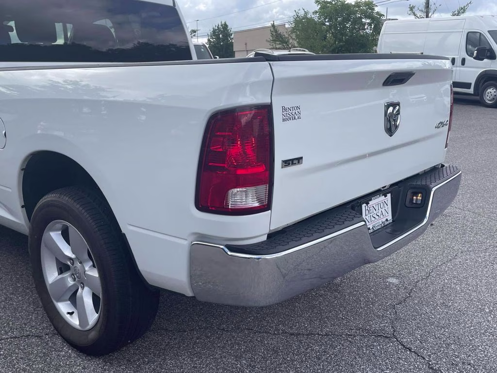 2024 Bright White Clearcoat Ram 1500 Classic SLT 4X4 Truck