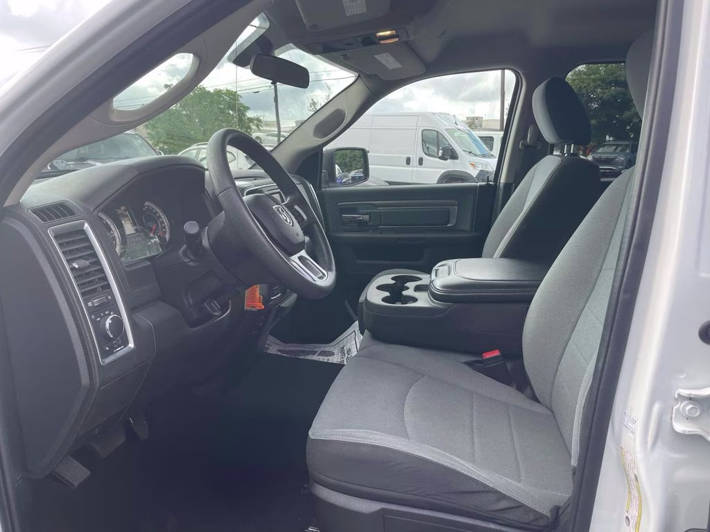 2024 Bright White Clearcoat Ram 1500 Classic SLT 4X4 Truck