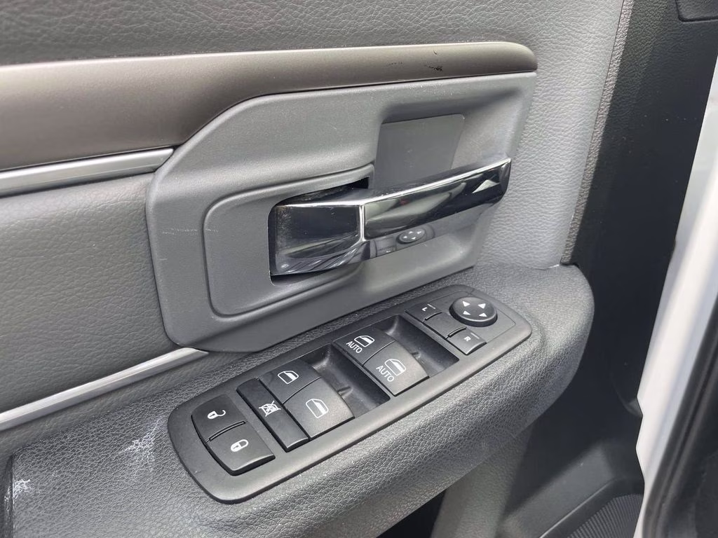 2024 Bright White Clearcoat Ram 1500 Classic SLT 4X4 Truck