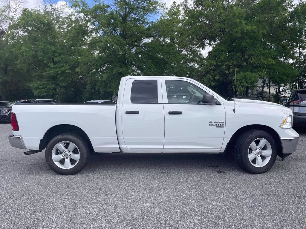 2024 Bright White Clearcoat Ram 1500 Classic SLT 4X4 Truck