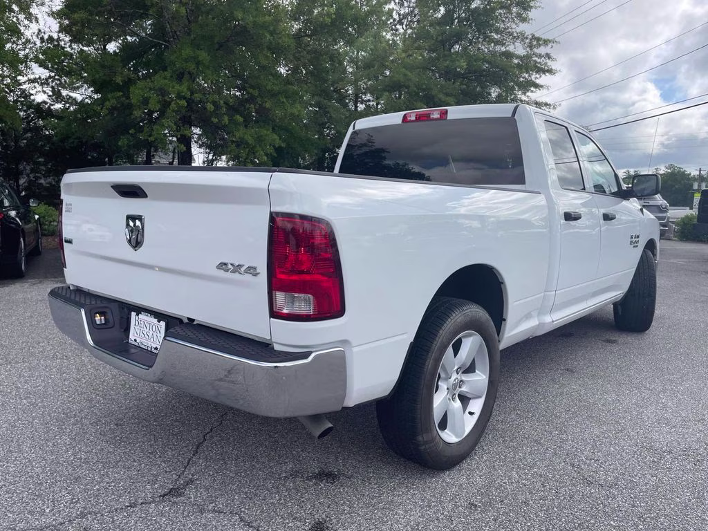 2024 Bright White Clearcoat Ram 1500 Classic SLT 4X4 Truck