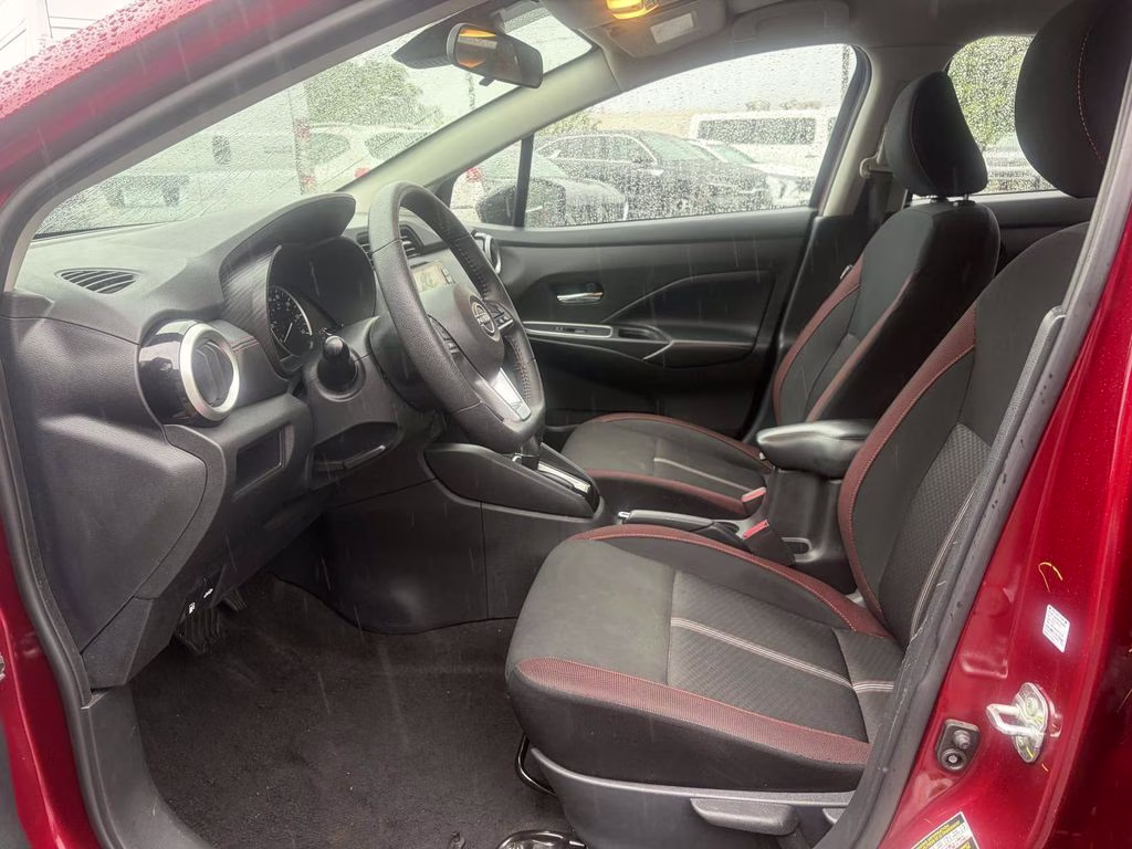 2024 Scarlet Ember Tintcoat Nissan Versa 1.6 SR FWD Sedan