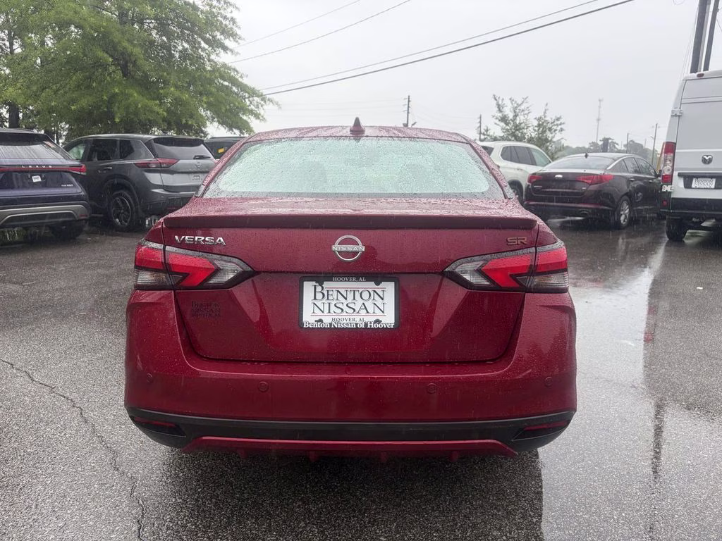 2024 Scarlet Ember Tintcoat Nissan Versa 1.6 SR FWD Sedan