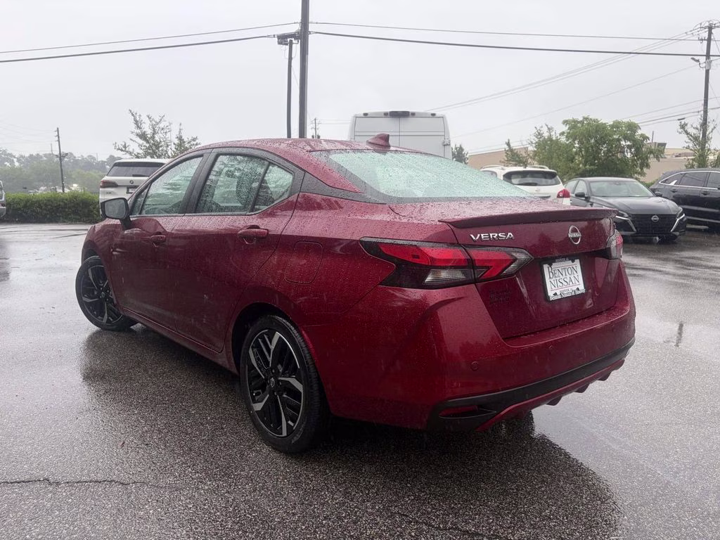 2024 Scarlet Ember Tintcoat Nissan Versa 1.6 SR FWD Sedan