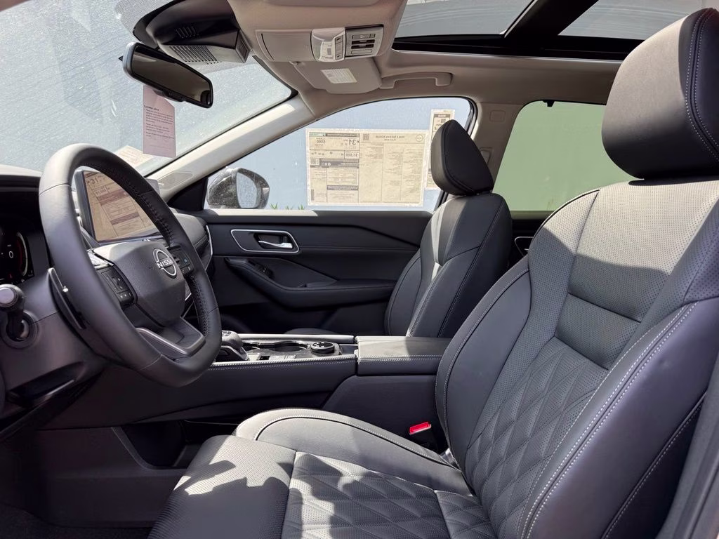 2026 Champagne Silver/Black Nissan Rogue Platinum AWD SUV