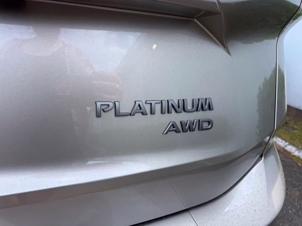 2026 Champagne Silver/Black Nissan Rogue Platinum AWD SUV