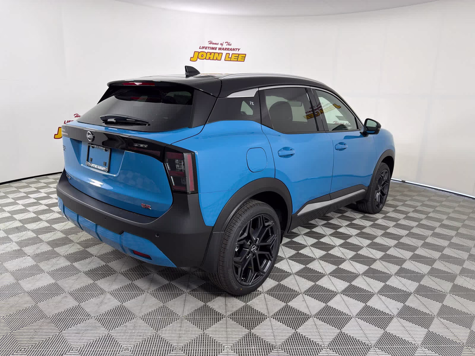2026 Arctic Ice Blue Metallic/Super Black Nissan Kicks SR FWD SUV