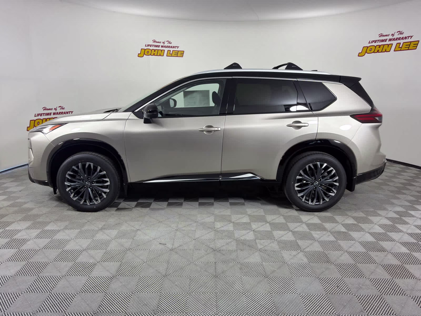 2026 Champagne Silver Metallic/Super Black Nissan Rogue Platinum AWD SUV