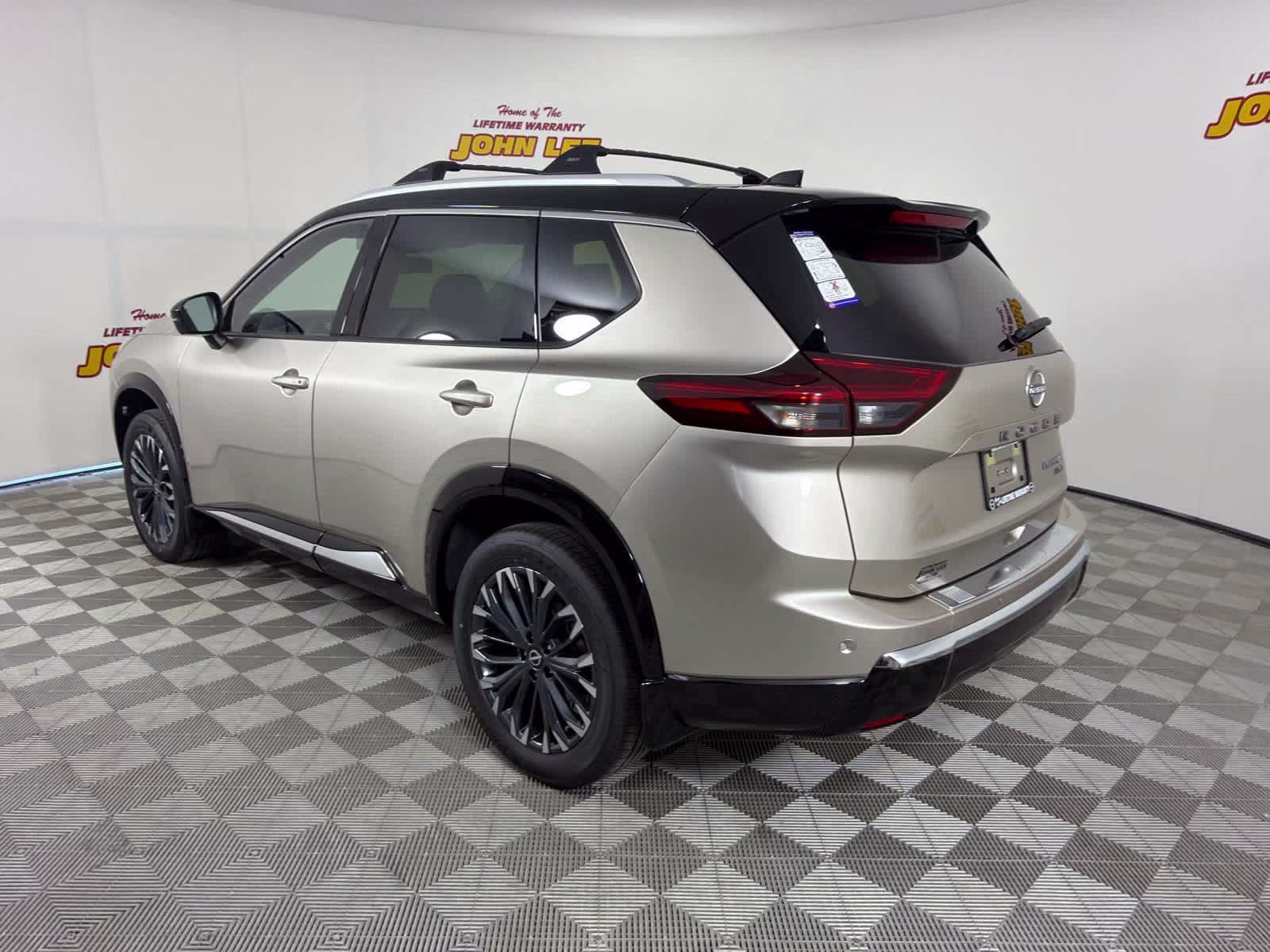 2026 Champagne Silver Metallic/Super Black Nissan Rogue Platinum AWD SUV