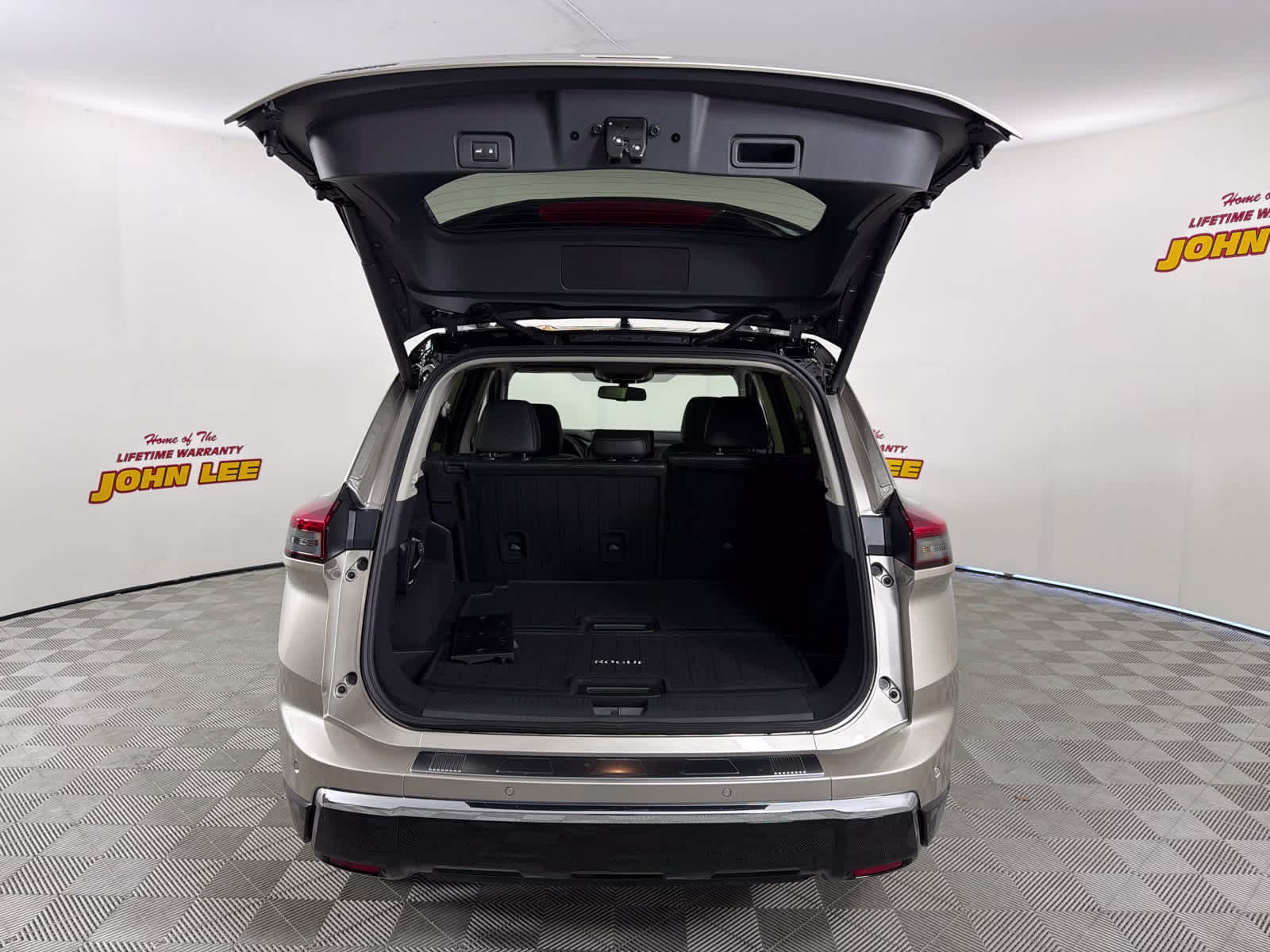 2026 Champagne Silver Metallic/Super Black Nissan Rogue Platinum AWD SUV