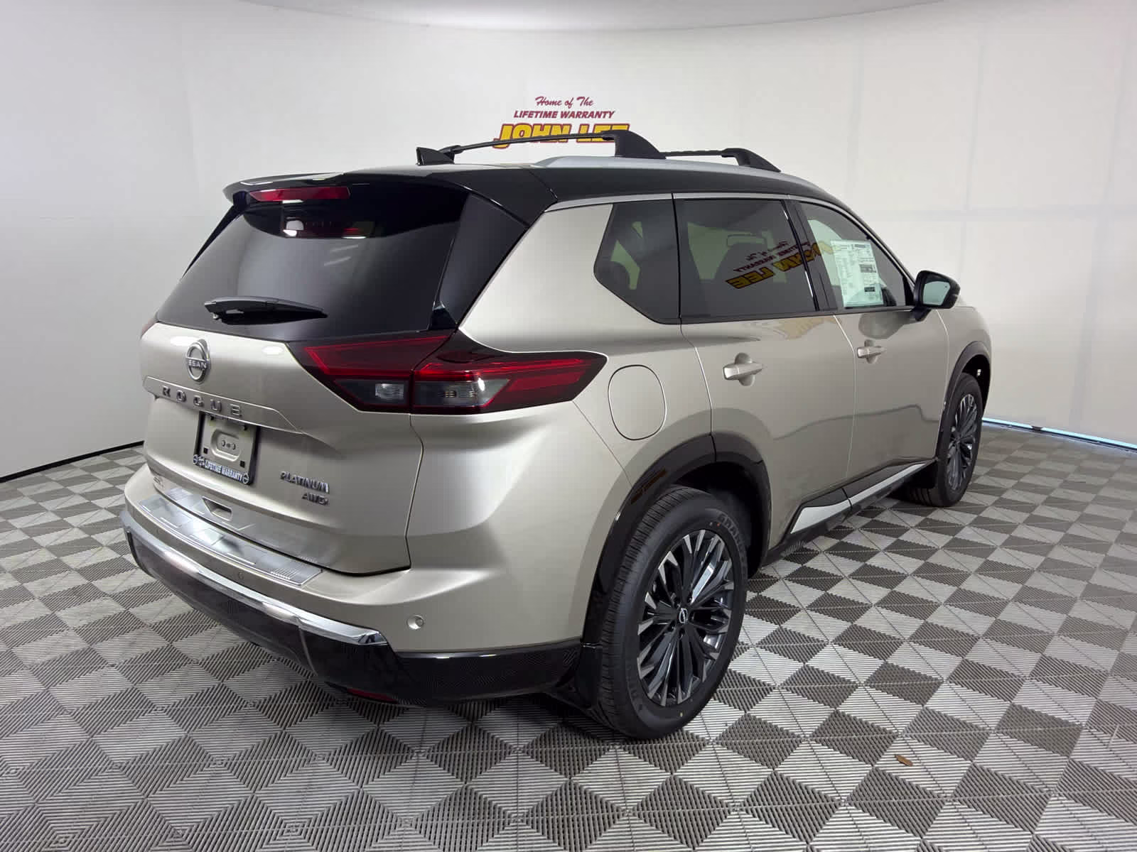 2026 Champagne Silver Metallic/Super Black Nissan Rogue Platinum AWD SUV
