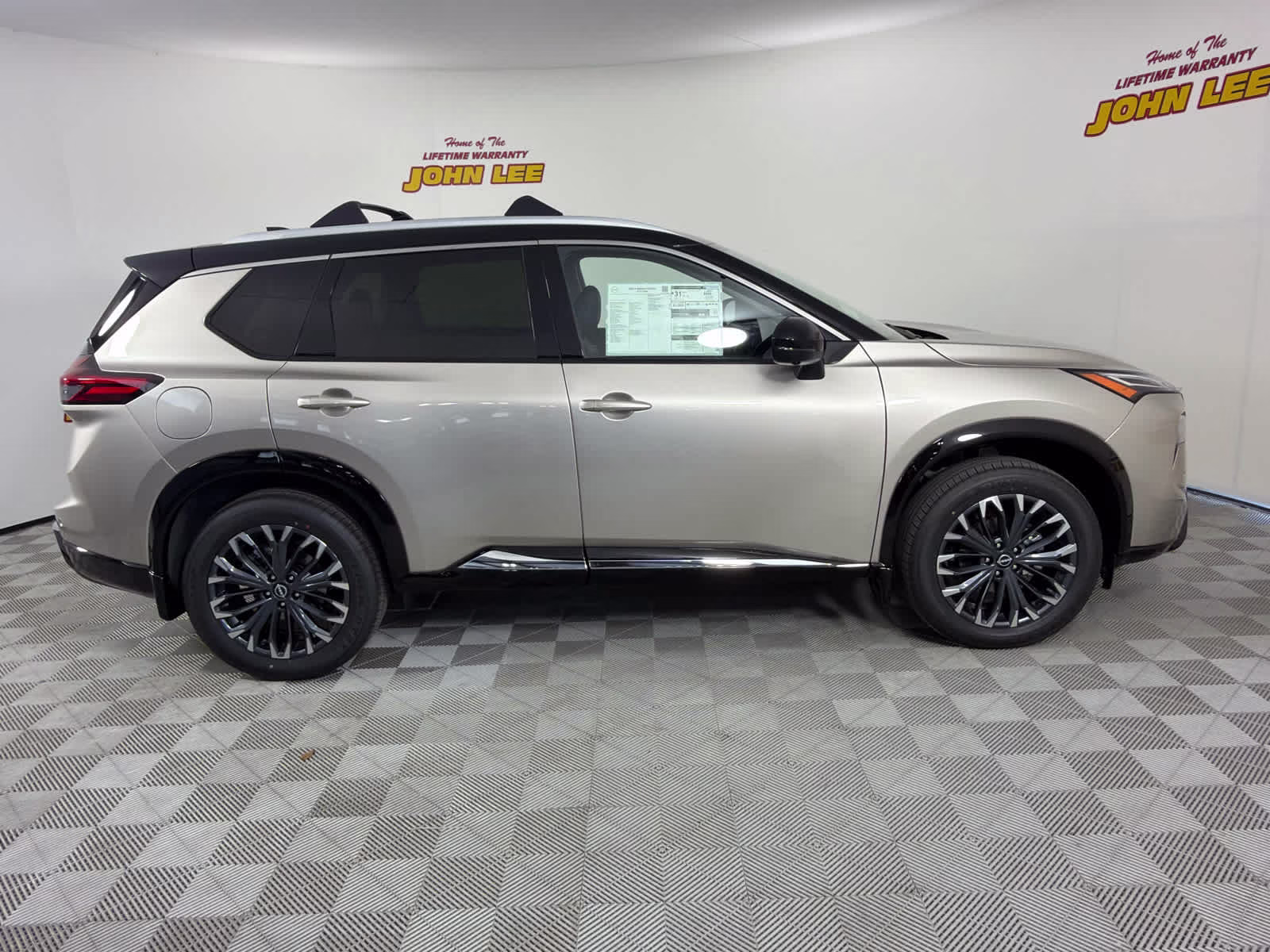 2026 Champagne Silver Metallic/Super Black Nissan Rogue Platinum AWD SUV