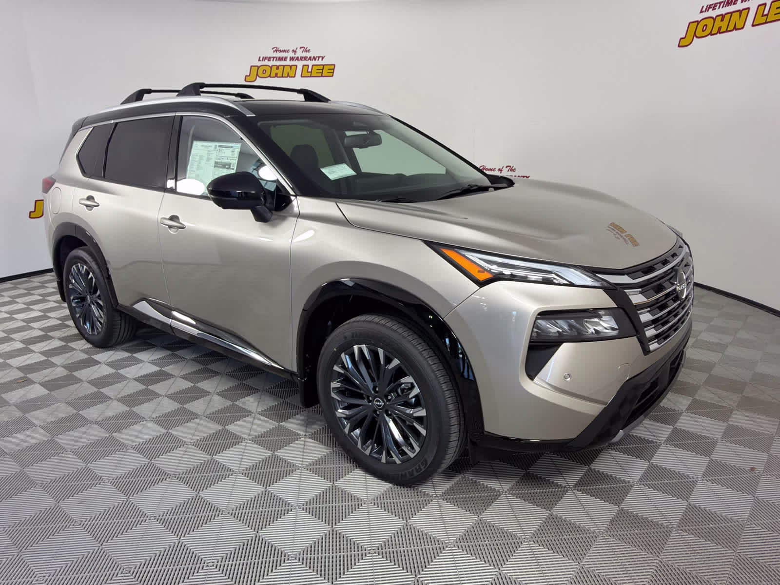 2026 Champagne Silver Metallic/Super Black Nissan Rogue Platinum AWD SUV