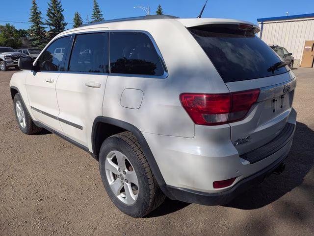 2011 Stone White Clearcoat Jeep Grand Cherokee Laredo 4X4 SUV