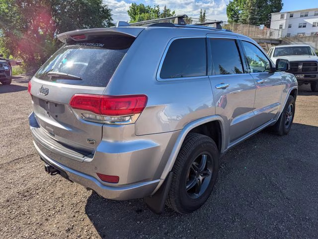 2014 Billet Silver Metallic Clearcoat Jeep Grand Cherokee Overland 4X4 SUV