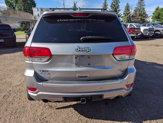 2014 Billet Silver Metallic Clearcoat Jeep Grand Cherokee Overland 4X4 SUV