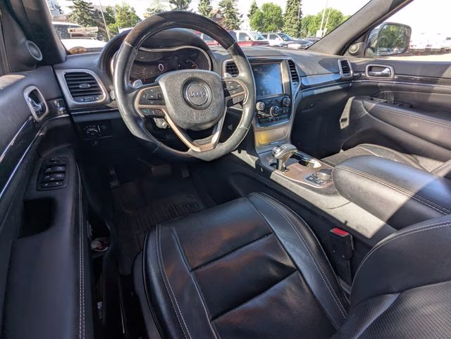 2014 Billet Silver Metallic Clearcoat Jeep Grand Cherokee Overland 4X4 SUV