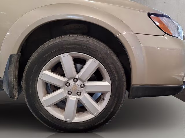 2009 Harvest Gold Metallic Subaru Outback 2.5i AWD Crossover