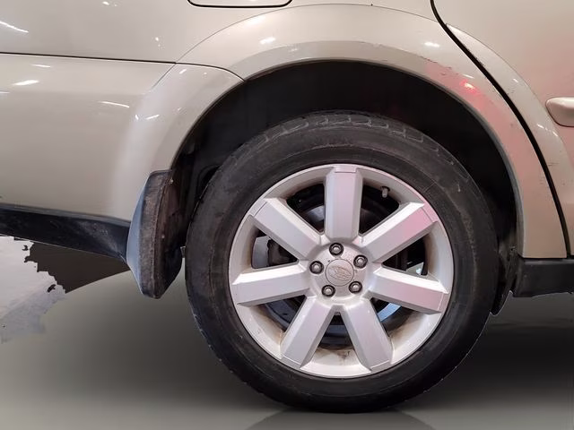 2009 Harvest Gold Metallic Subaru Outback 2.5i AWD Crossover