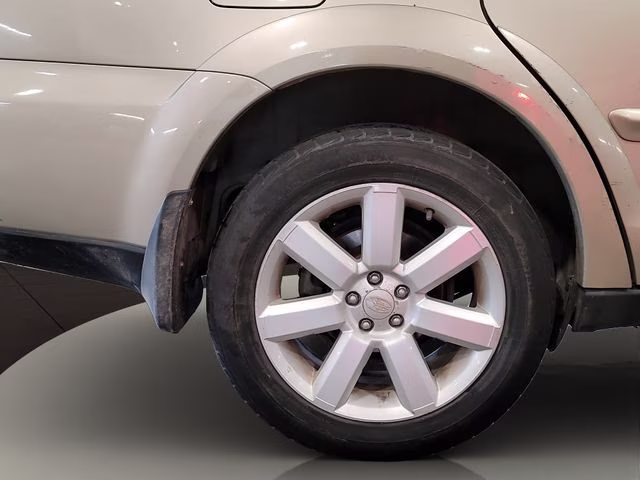 2009 Harvest Gold Metallic Subaru Outback 2.5i AWD Crossover