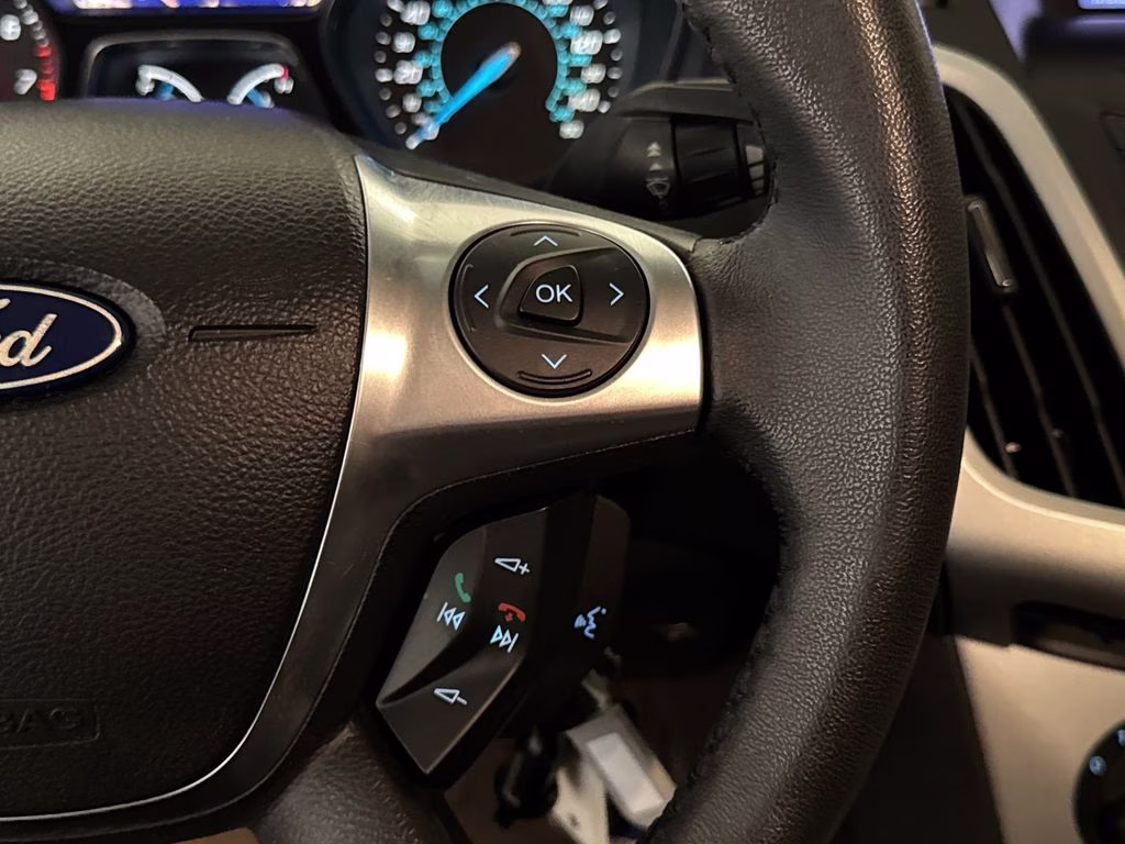 2012 Sterling Gray Metallic Ford Focus SE FWD Hatchback